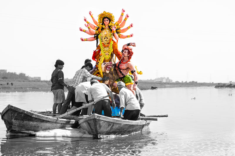 Idol of goddess Durga being immersed in river Yamuna in South-East district, National Capital Territory of Delhi